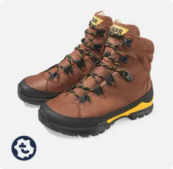 Braune Wanderstiefel aus Leder mit gelben Akzenten und robuster Sohle, ideal für Bergtouren